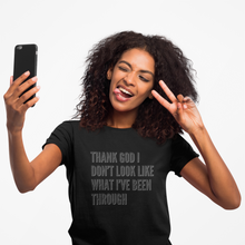 Load image into Gallery viewer, Thank God I Don't Look Like What I've Been Through Unisex T-Shirt