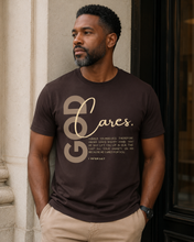 Load image into Gallery viewer, Brown God Cares Unisex Short Sleeve T-Shirt: I Peter 5:6-7 By: A. Perry
