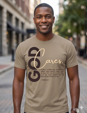 Load image into Gallery viewer, Brown God Cares Unisex Short Sleeve T-Shirt: I Peter 5:6-7 By: A. Perry
